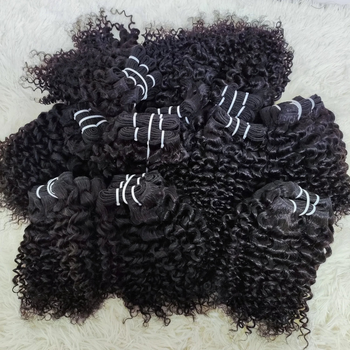 Tissages Brésiliens Kinky Curly Virgin Remy Hair